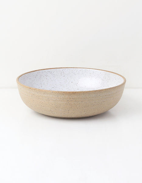 https://www.wolveswithin.com/cdn/shop/products/WHITE-RAW-SPECKLED-LARGE-BOWL-HOME-OF-THE-BRAVE_WOLVES-WITHIN_01_grande.jpg?v=1584813858